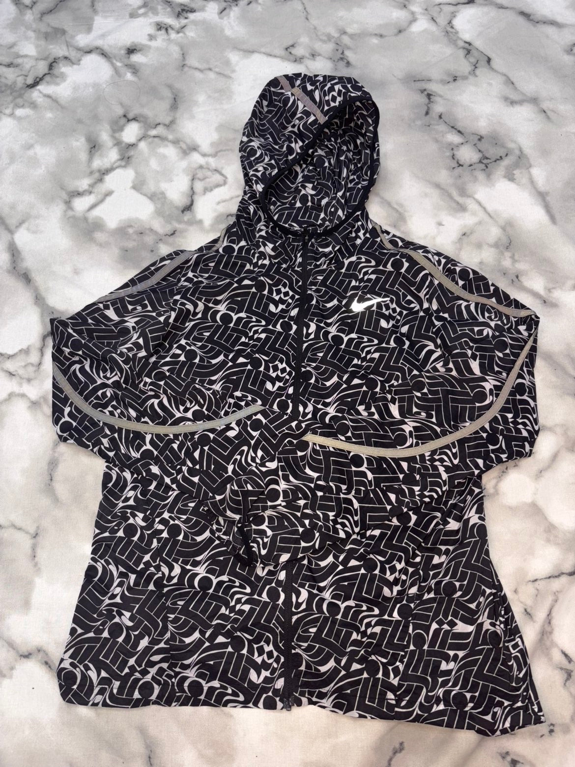 Nike ‘Running Man’ Windrunner USED